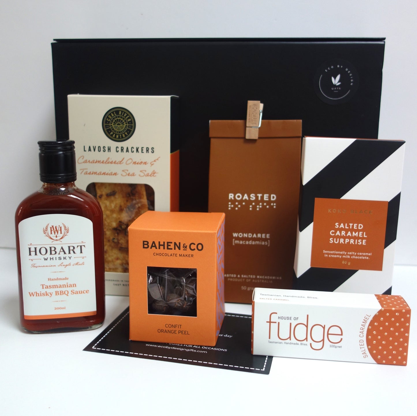 Tasmanian gourmet gift hamper featuring Hobart Whisky BBQ Sauce, lavosh crackers, Bahen & Co chocolate, and more.