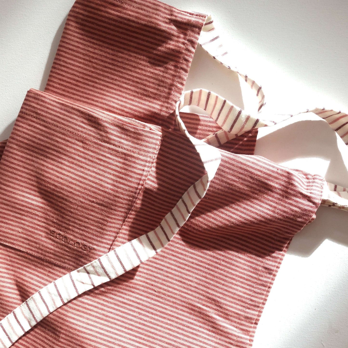 Grateful striped cotton apron from Ecology Homewares, part of a gratitude gift box.