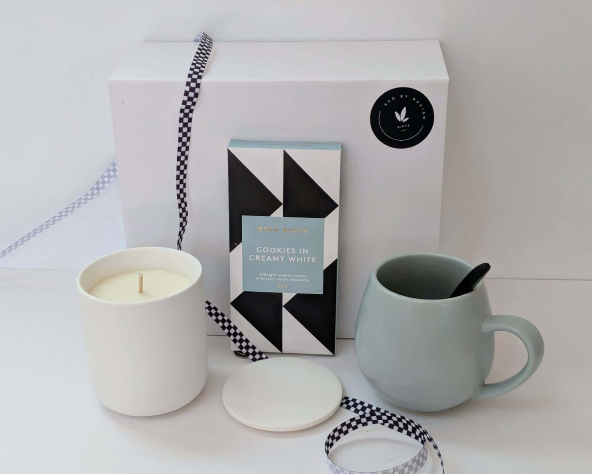 Big Hugs female gift hamper featuring eco-friendly candle, duck egg blue mug, and stylish box.