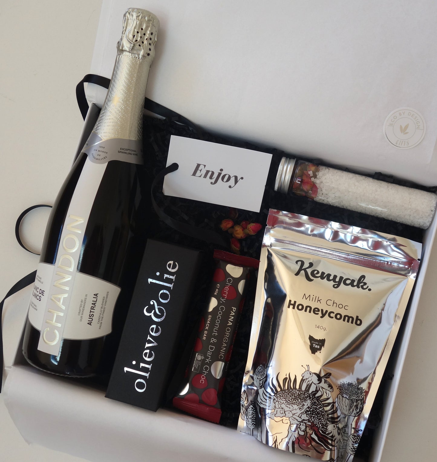 Luxury female gift box featuring Chandon champagne, chocolate honeycomb, and gourmet treats.
