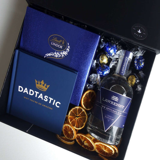 For Dad gift box featuring Lawrenny Gin, Lindt chocolate, Dadtastic book, and dried orange slices.